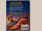 Book cover with a man and creature, text about parasites and partying, on a beige background
